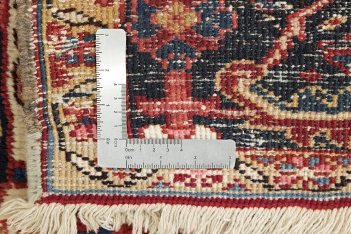 Corner detail of 1940s Heriz rug showing border pattern and Wool pile