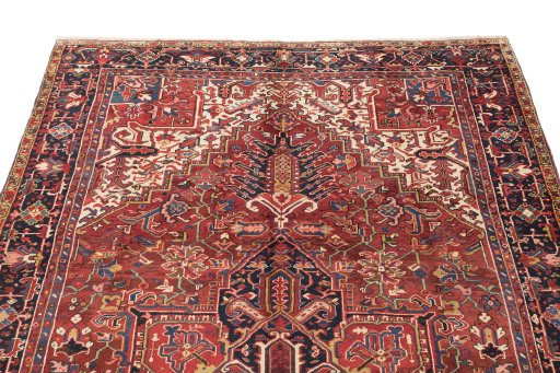 Surface texture of 1940s Heriz rug with natural Wool and intricate pattern