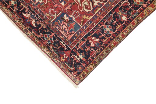 Backside of handmade 1940s Heriz rug showing knot structure and weave density