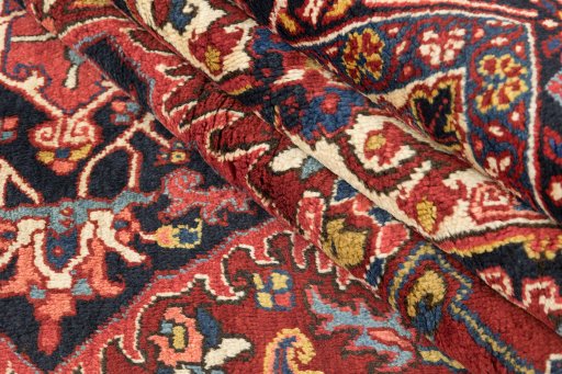 Corner detail of 1940s Heriz rug showing border pattern and Wool pile