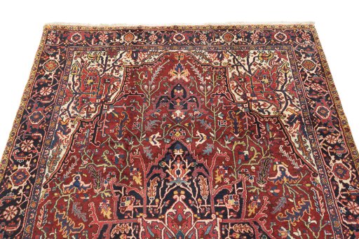 Surface texture of 1940s Heriz rug with natural Wool and intricate pattern