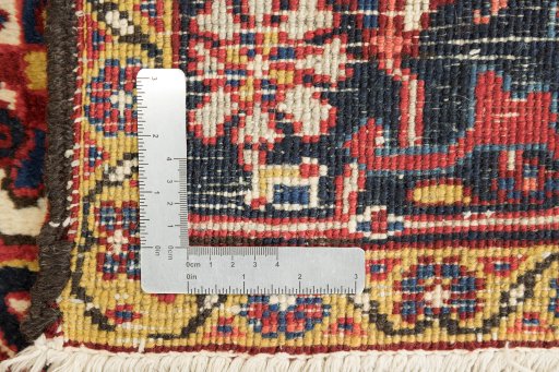 Full view of 1940s Heriz rug from Iran / Persia, 351 × 234 cm in Red tones