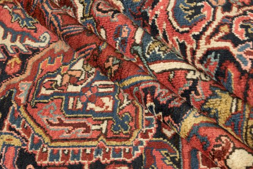 Corner detail of 1940s Heriz rug showing border pattern and Wool pile