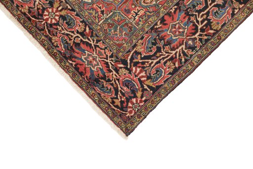 Backside of handmade 1940s Heriz rug showing knot structure and weave density