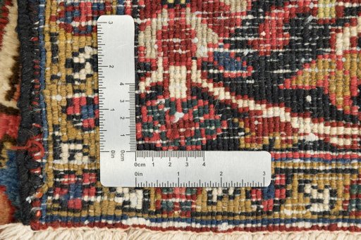 Full view of 1940s Heriz rug from Iran / Persia, 340 × 254 cm in Red tones