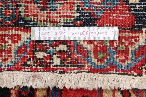 Corner detail of 1940s Heriz rug showing border pattern and Wool pile