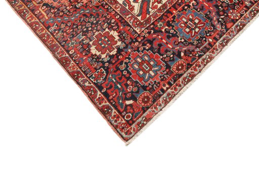 Backside of handmade 1940s Heriz rug showing knot structure and weave density