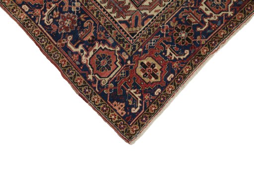 Backside of handmade 1940s Heriz rug showing knot structure and weave density