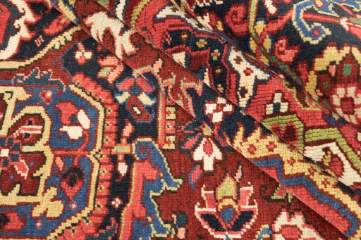 Corner detail of 1940s Heriz rug showing border pattern and Wool pile