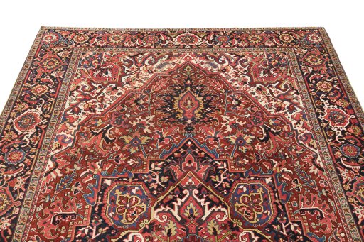 Surface texture of 1940s Heriz rug with natural Wool and intricate pattern