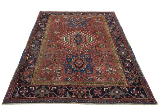 Surface texture of 1930s Heriz rug with natural Wool and intricate pattern