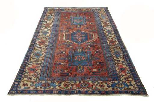 Surface texture of 1930s Heriz rug with natural Wool and intricate pattern