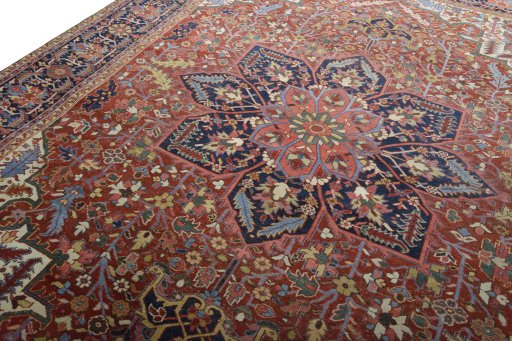 Backside of handmade 1930s Heriz rug showing knot structure and weave density