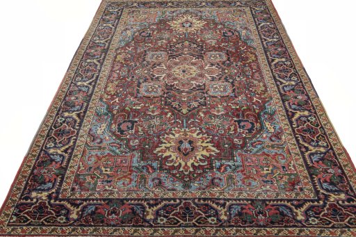 Surface texture of 1930s Heriz rug with natural Wool and intricate pattern
