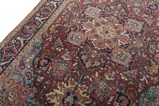 Backside of handmade 1930s Heriz rug showing knot structure and weave density