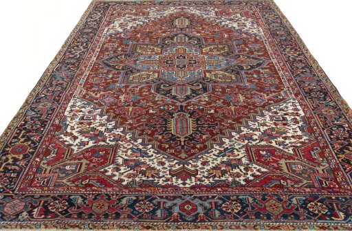 Surface texture of 1930s Heriz rug with natural Wool and intricate pattern