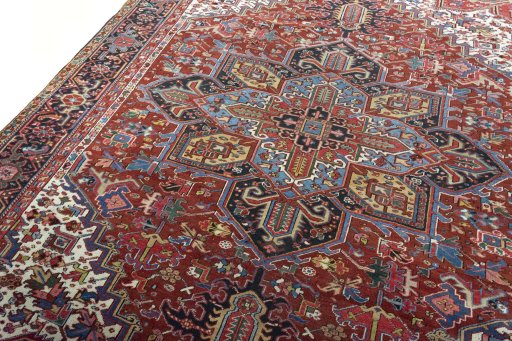 Backside of handmade 1930s Heriz rug showing knot structure and weave density