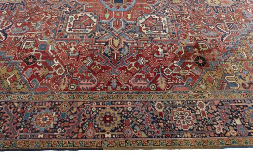 Corner detail of 1930s Heriz rug showing border pattern and Wool pile