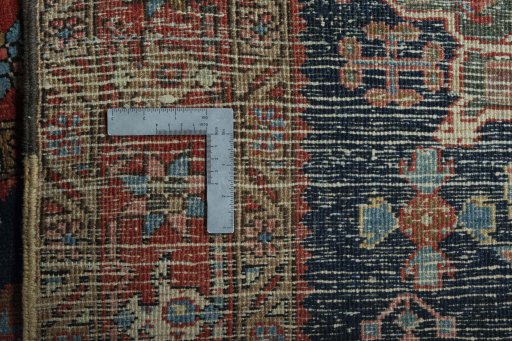 Close-up detail of 1930s Heriz rug from Iran / Persia showing Wool weave