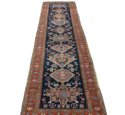 Surface texture of 1930s Heriz rug with natural Wool and intricate pattern