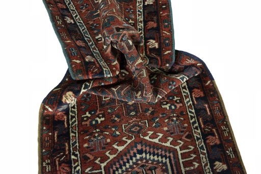Corner detail of 1930s Heriz rug showing border pattern and Wool pile