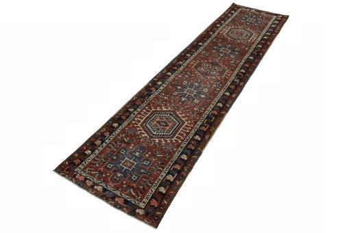 Corner detail of 1930s Heriz rug showing border pattern and Wool pile