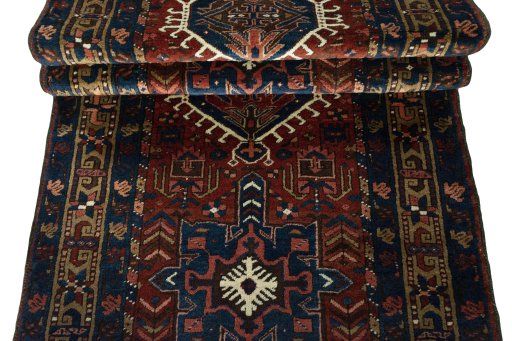 Corner detail of 1930s Heriz rug showing border pattern and Wool pile