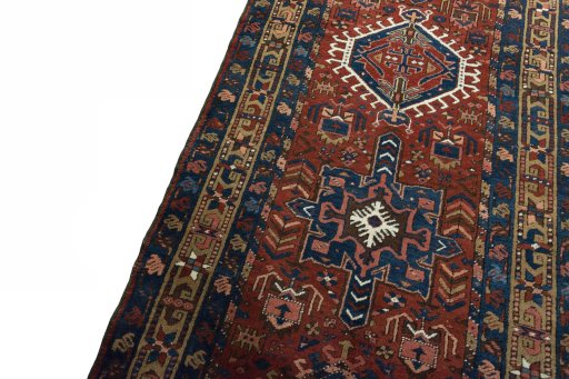 Backside of handmade 1930s Heriz rug showing knot structure and weave density