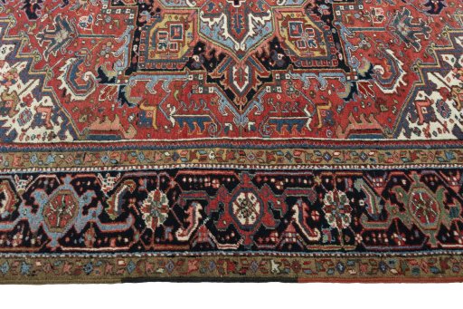 Corner detail of 1930s Heriz rug showing border pattern and Wool pile