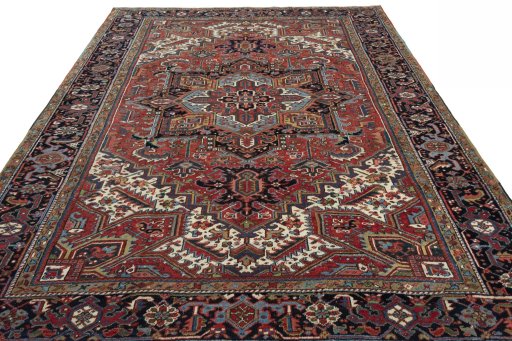 Surface texture of 1930s Heriz rug with natural Wool and intricate pattern