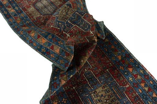 Corner detail of 1930s Heriz rug showing border pattern and Wool pile