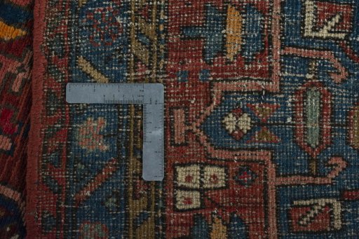 Close-up detail of 1930s Heriz rug from Iran / Persia showing Wool weave