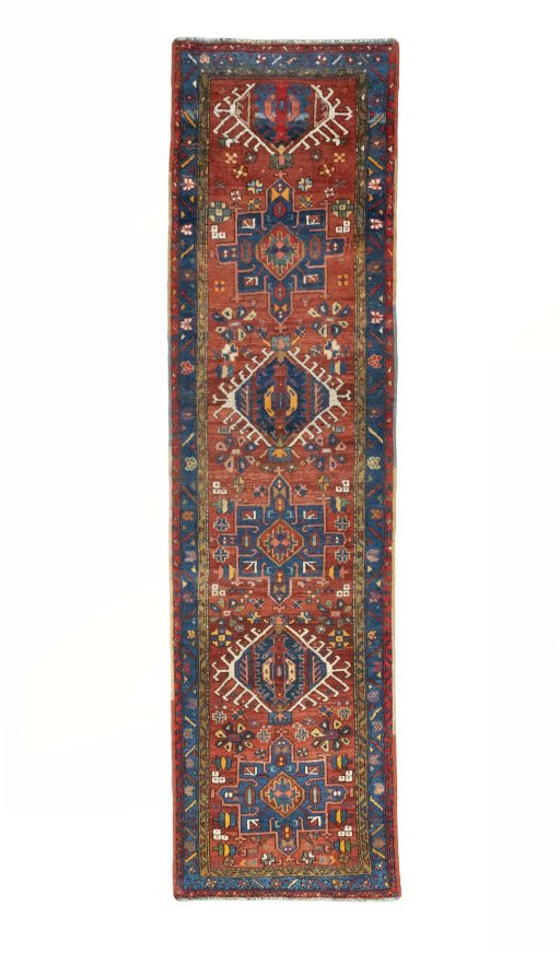 Full view of 1930s Heriz rug from Iran / Persia, 320 × 85 cm in Red tones