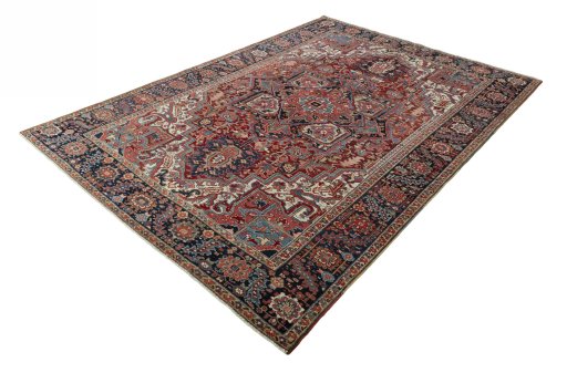 Corner detail of 1930s Heriz rug showing border pattern and Wool pile