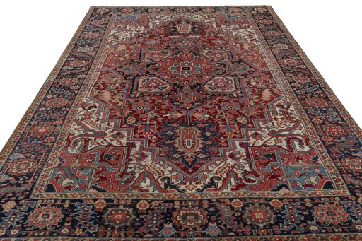 Surface texture of 1930s Heriz rug with natural Wool and intricate pattern