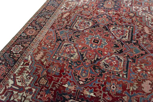 Backside of handmade 1930s Heriz rug showing knot structure and weave density