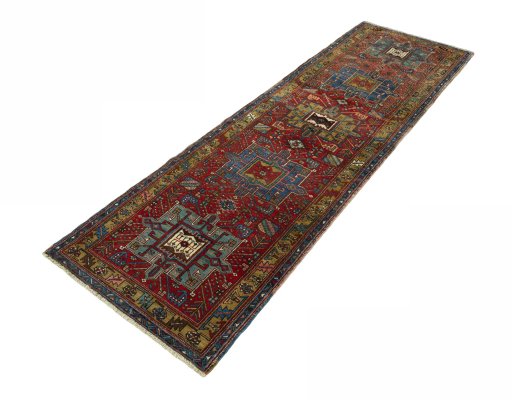 Corner detail of 1930s Heriz rug showing border pattern and Wool pile