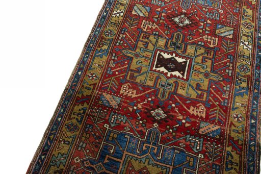 Backside of handmade 1930s Heriz rug showing knot structure and weave density