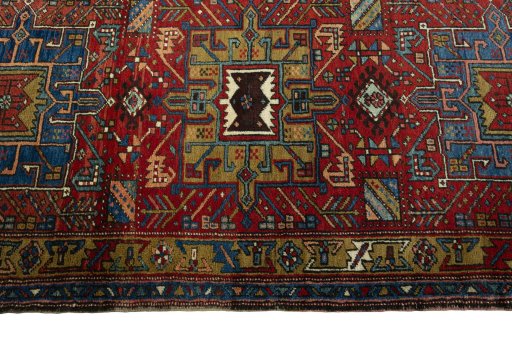 Full view of 1930s Heriz rug from Iran / Persia, 328 × 97 cm in Red tones
