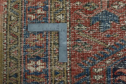 Close-up detail of 1930s Heriz rug from Iran / Persia showing Wool weave