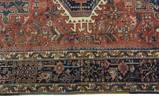 Corner detail of 1930s Heriz rug showing border pattern and Wool pile