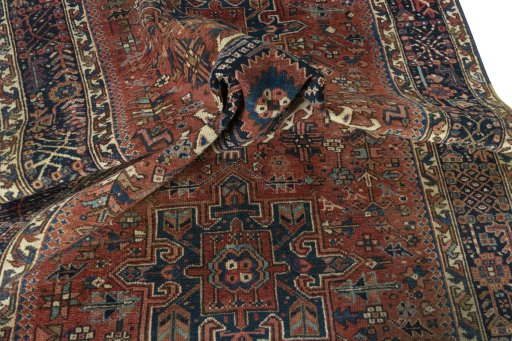 Surface texture of 1930s Heriz rug with natural Wool and intricate pattern