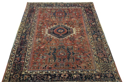 Surface texture of 1930s Heriz rug with natural Wool and intricate pattern