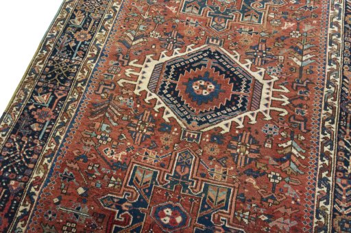 Backside of handmade 1930s Heriz rug showing knot structure and weave density