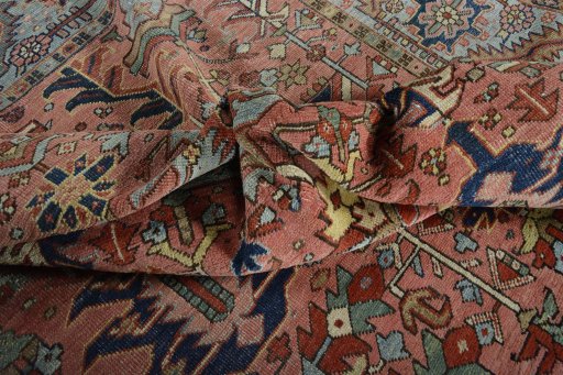 Surface texture of 1930s Heriz rug with natural Wool and intricate pattern