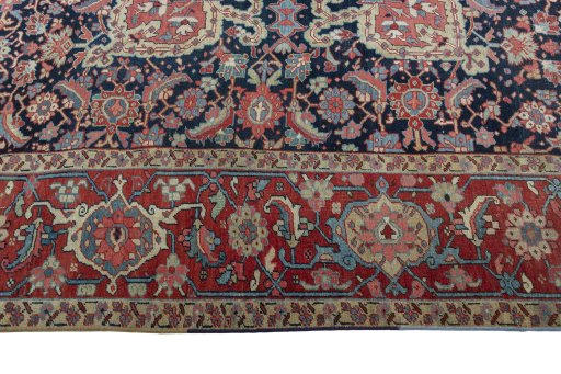 Corner detail of 1930s Heriz rug showing border pattern and Wool pile