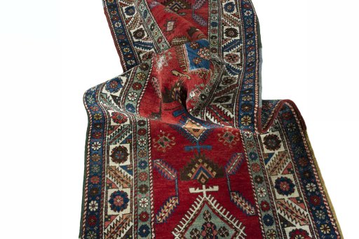 Corner detail of 1950s Heriz rug showing border pattern and Wool pile