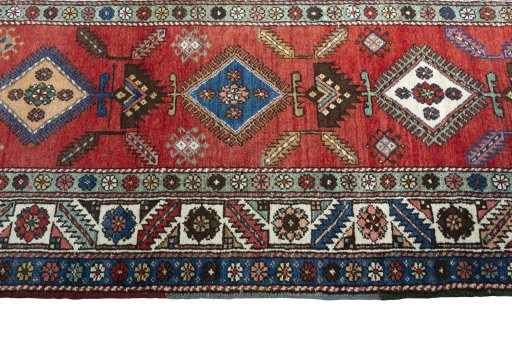 Close-up detail of 1950s Heriz rug from Iran / Persia showing Wool weave