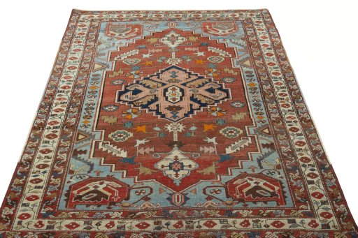 Surface texture of 1930s Heriz rug with natural Wool and intricate pattern