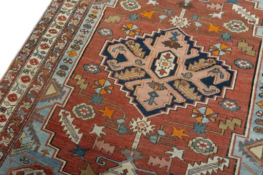 Backside of handmade 1930s Heriz rug showing knot structure and weave density